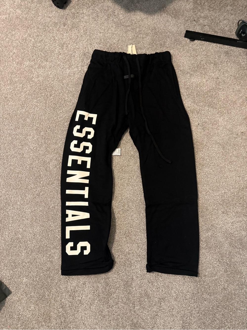 Fear of God Black Sweatpants with White 'ESSENTIALS' Side Logo